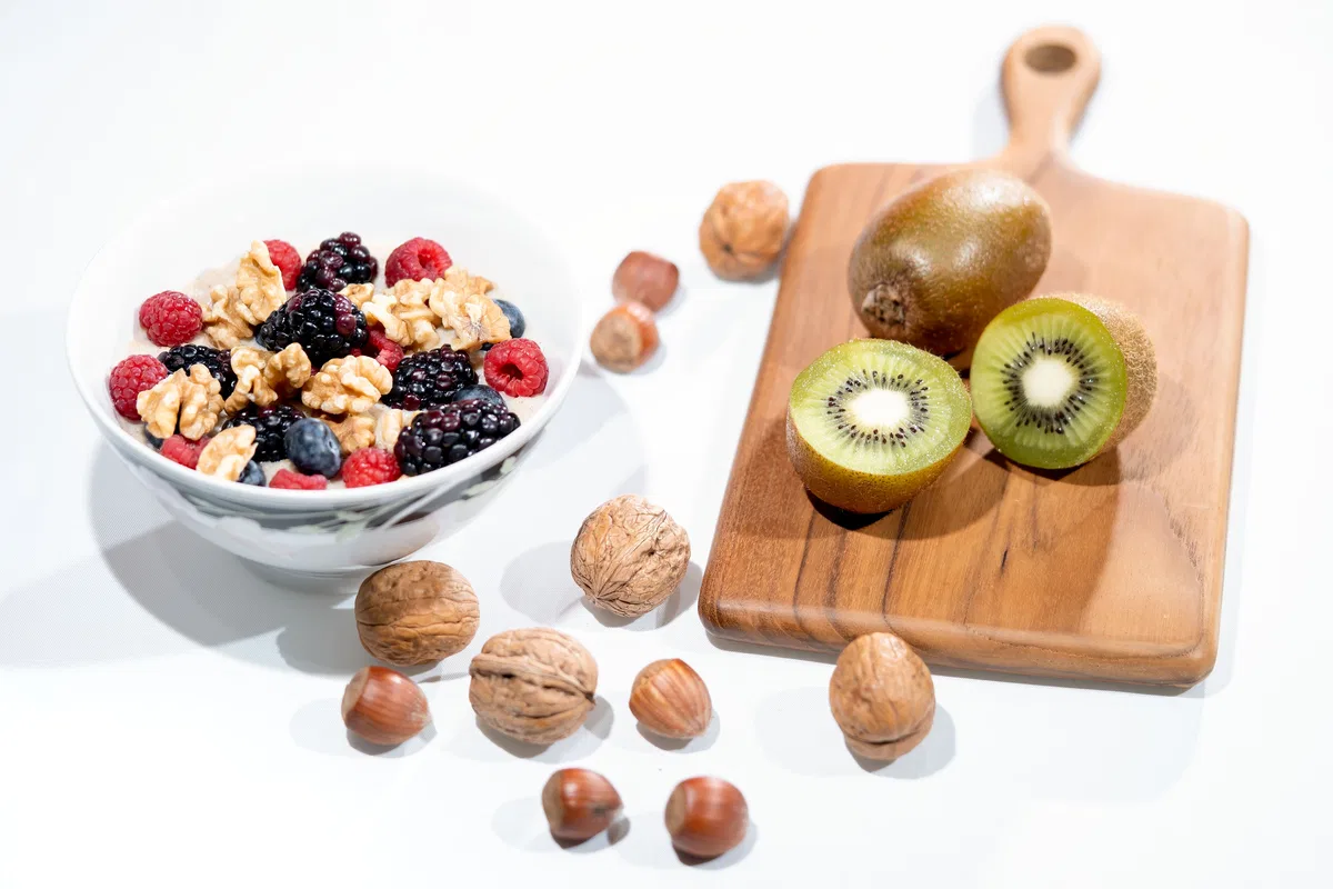 Fresh berries with plain yoghurt, oats and nuts.